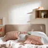 Bed 140x200 with upholstered slanted headrest Well